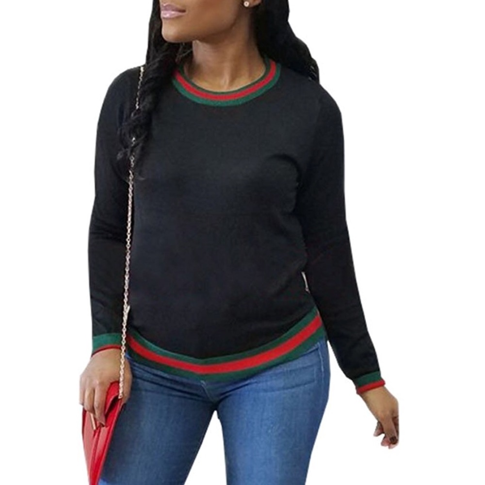 Black shirt with green and red stripe on sleeve